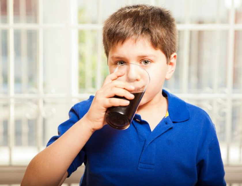 Boy Drinking Soda