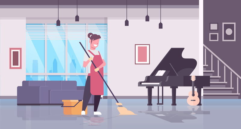 Woman cleaning next to a piano