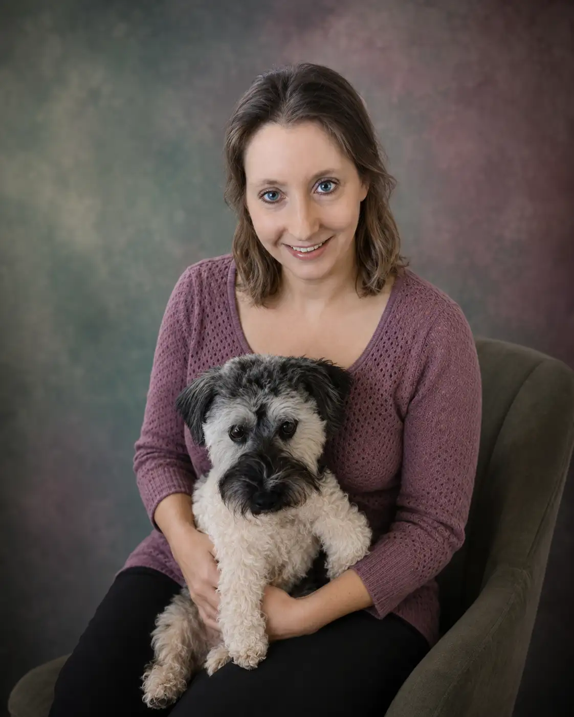 Ceri Clark smiling with her dog